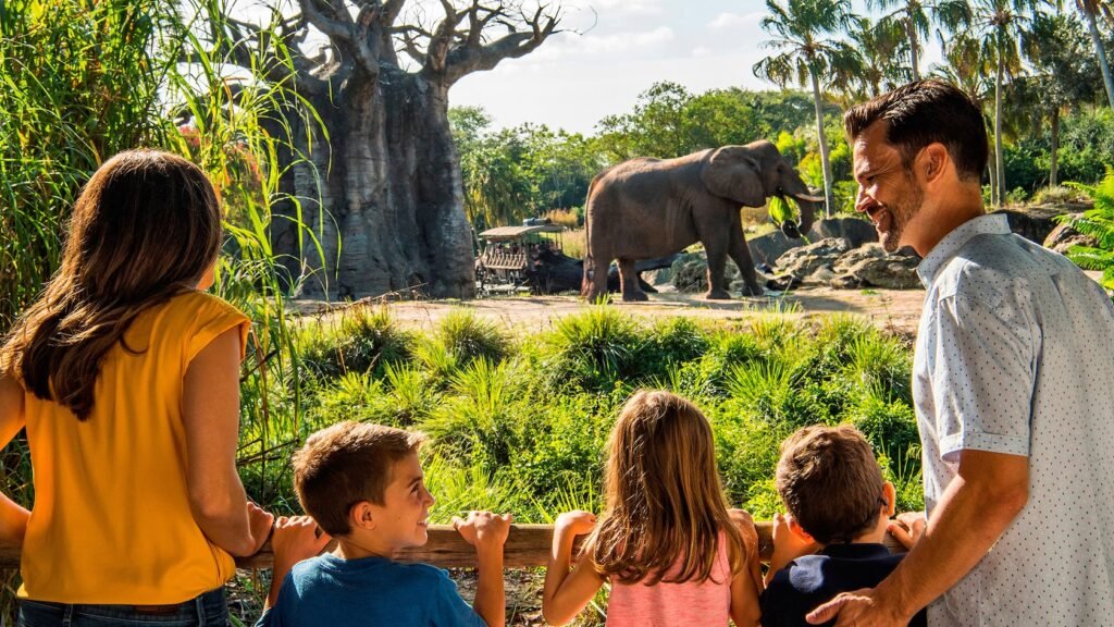 A family of 5 looking at an elephant during Savor the Savanna at Disney's Animal Kingdom Park