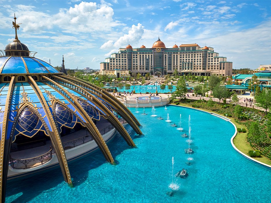 A view of Helios Grand Hotel from Celestial Park in Epic Universe