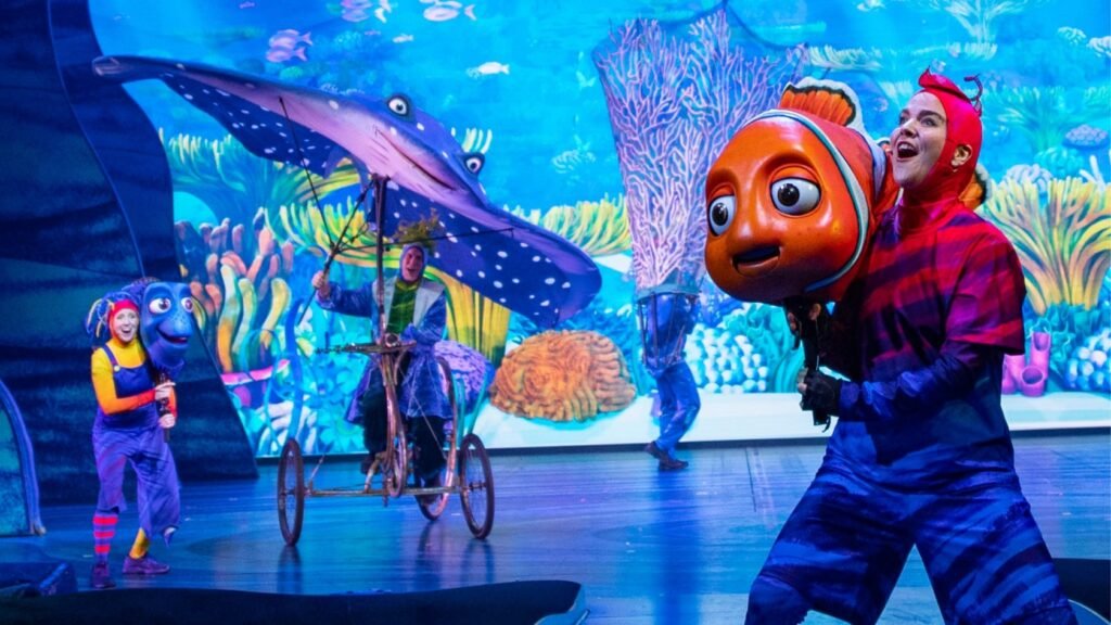 Cast members on stage use puppets during Finding Nemo The Big Blue and Beyond show in DinoLand USA at Disney's Animal Kingdom theme park